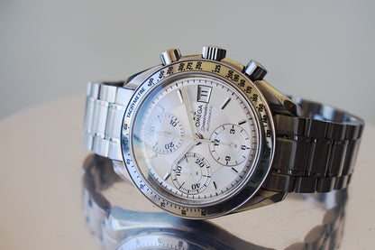 Omega SpeedMaster, box and warranty