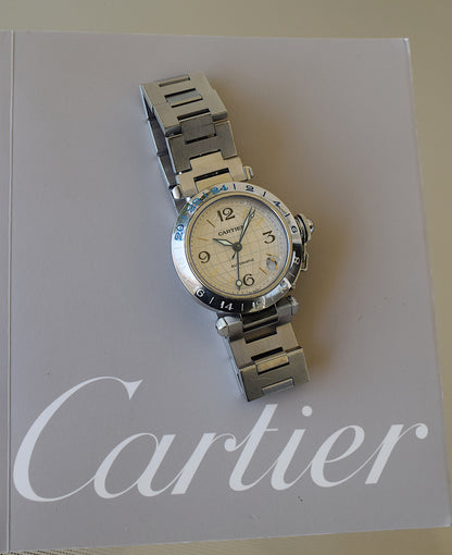 Cartier Pasha GMT, con garantía